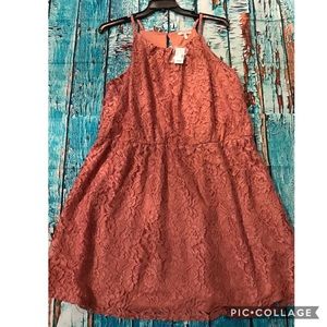 Lace knee length dress.